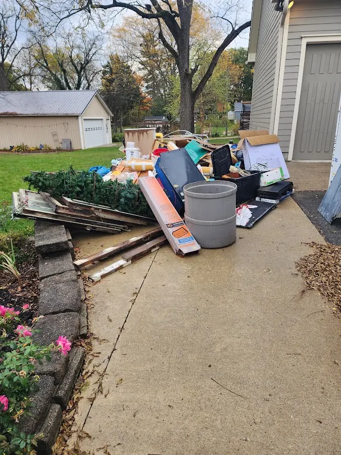 Dumpster being loaded with debris for 3 Yard Dumpster Rental in Chula Vista